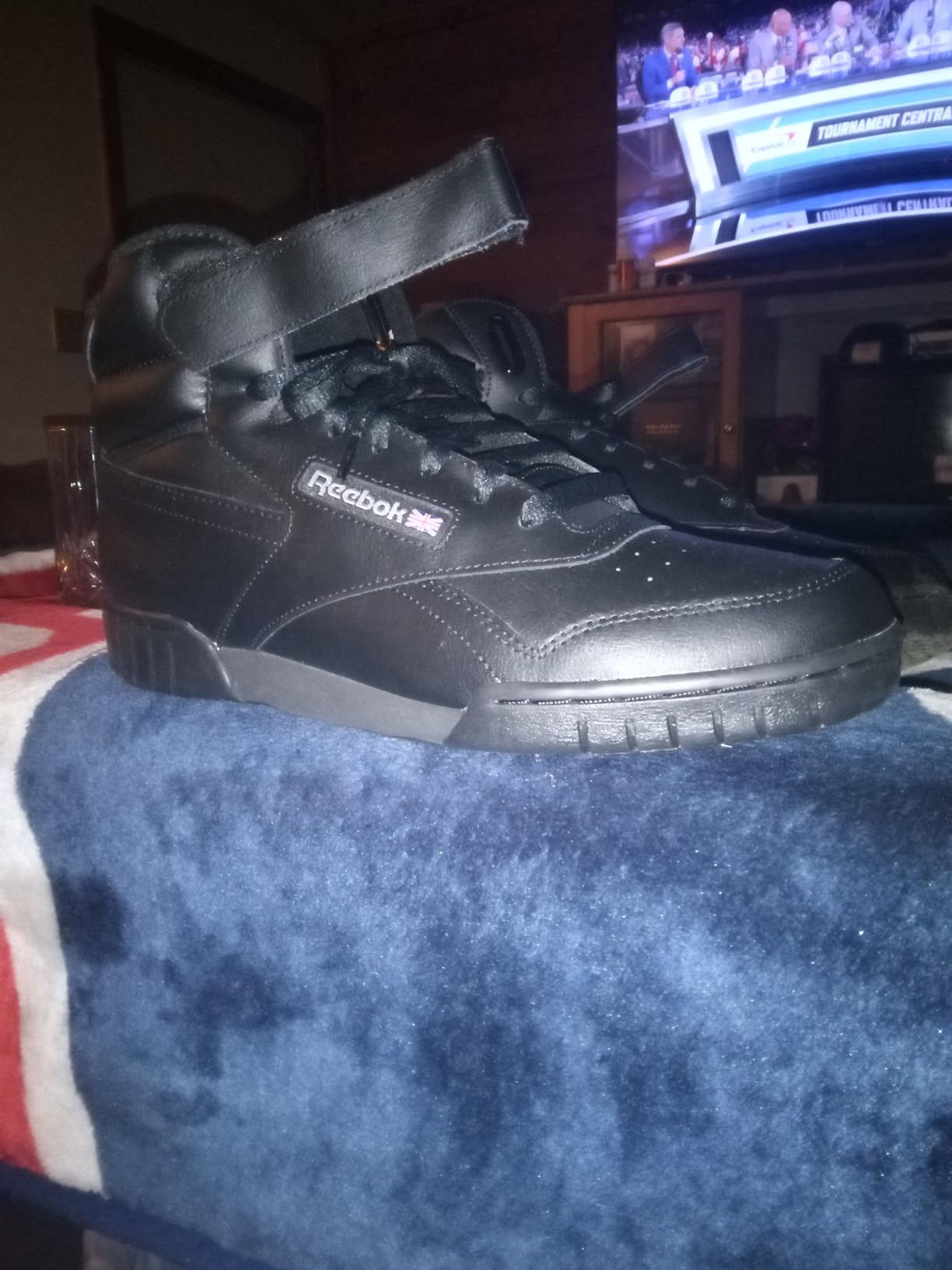 Reebok EX-O-FIT HI in action during basketball showing ankle support during lateral movement