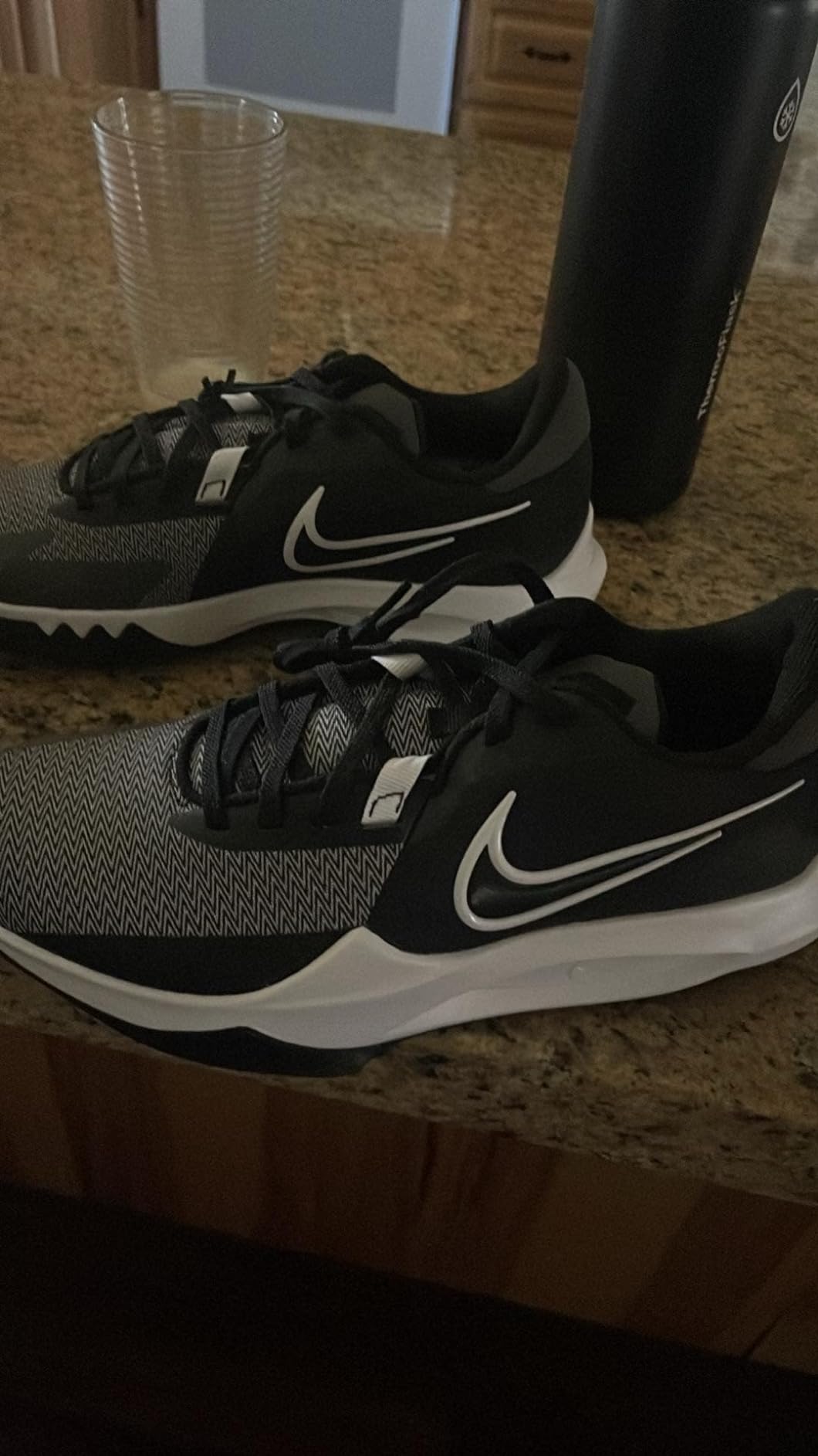 Nike Downshifter 12 in various weather conditions showing outdoor durability and real-world wear