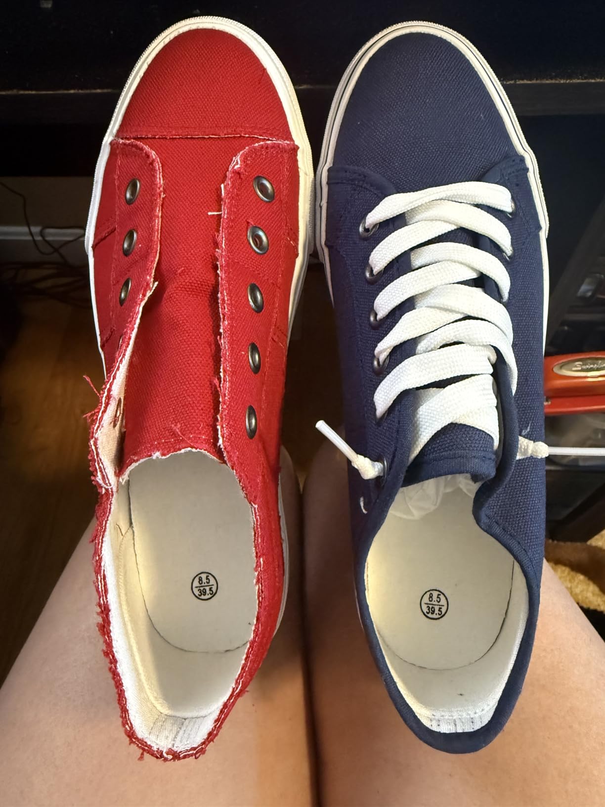 Close-up view of XRH canvas sneakers showing lace detail and elastic band slip-on design features