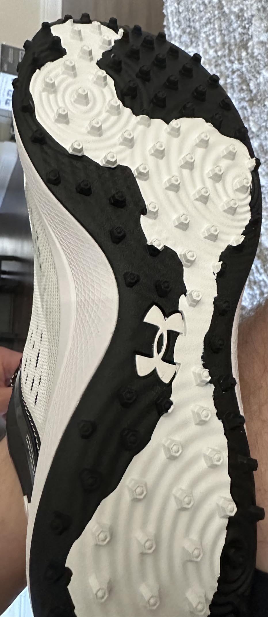 Under Armour Yard Low turf cleat rubber outsole showing lug pattern and traction design