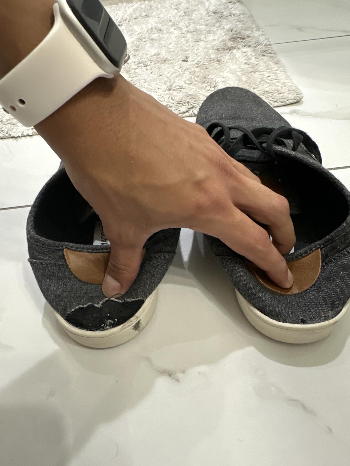 Heel fabric tearing on Steve Madden Fenta — documented failure at the heel counter