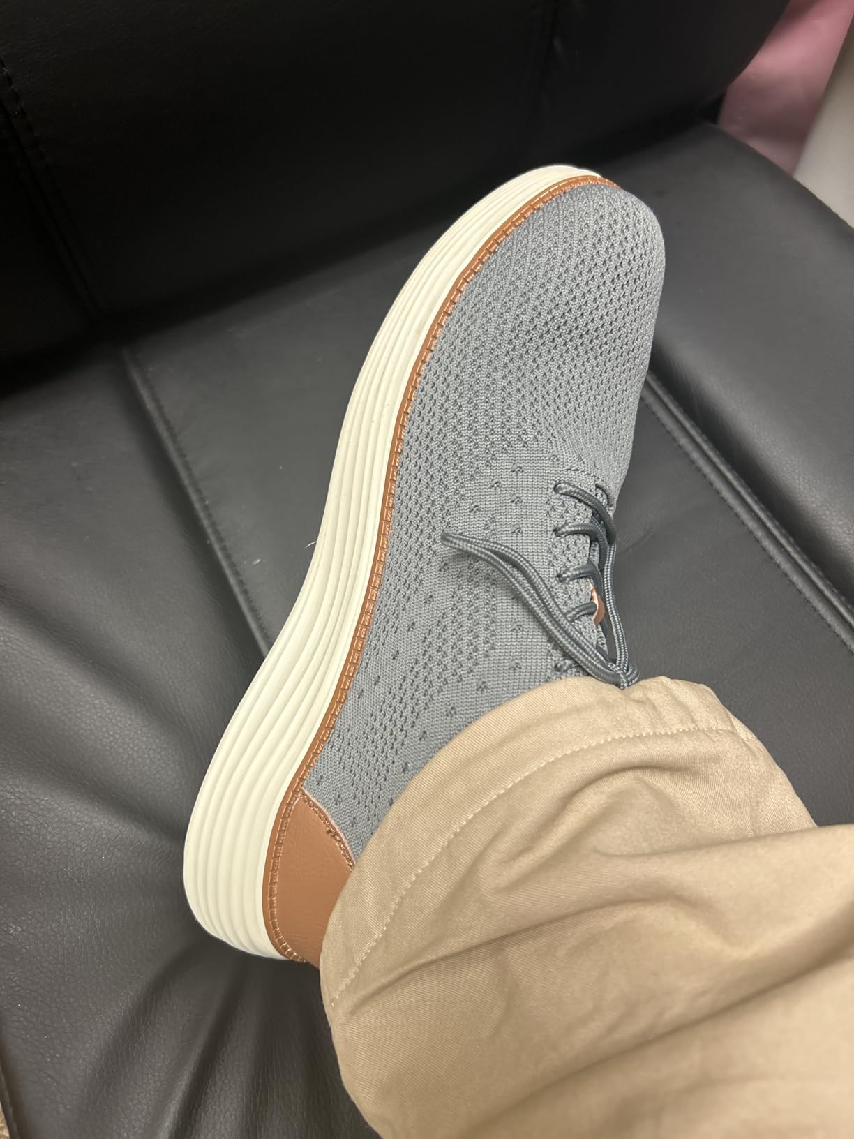 Close-up of VILOCY knit mesh upper showing breathable weave construction and lace detail
