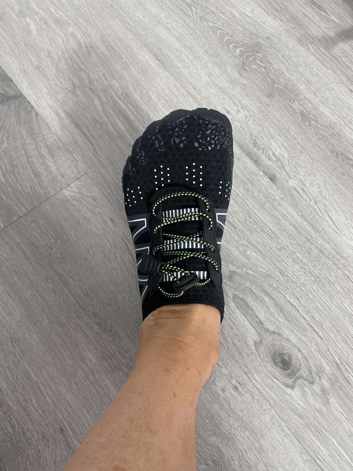 Overall assessment showing water shoes in family-friendly casual use demonstrating strengths and limitations