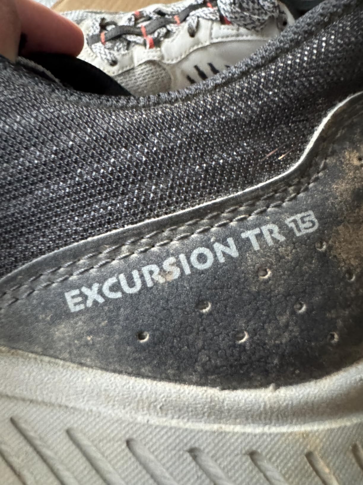 Saucony TR15 after months of trail testing showing upper mesh beginning to separate from midsole at toe area