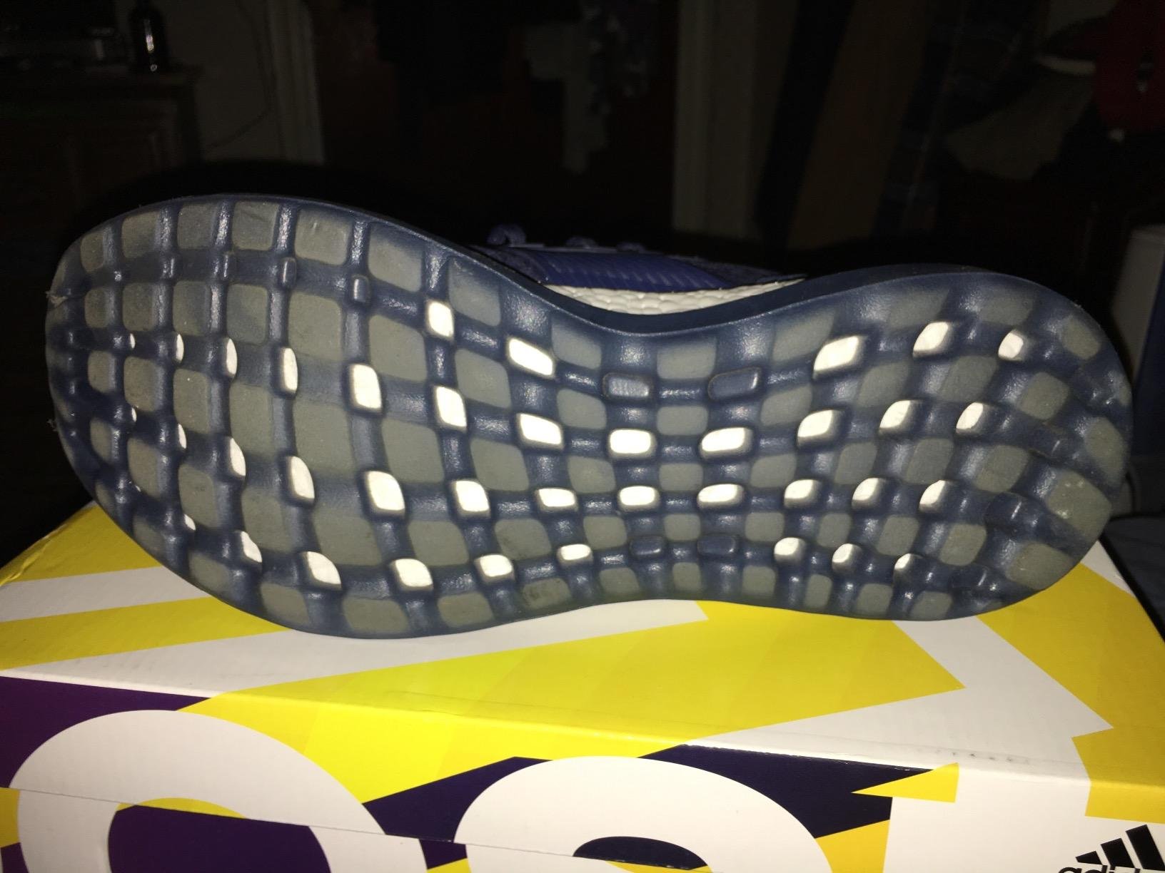 Adidas Pureboost ZG product overview showing the lacing system and overall construction quality