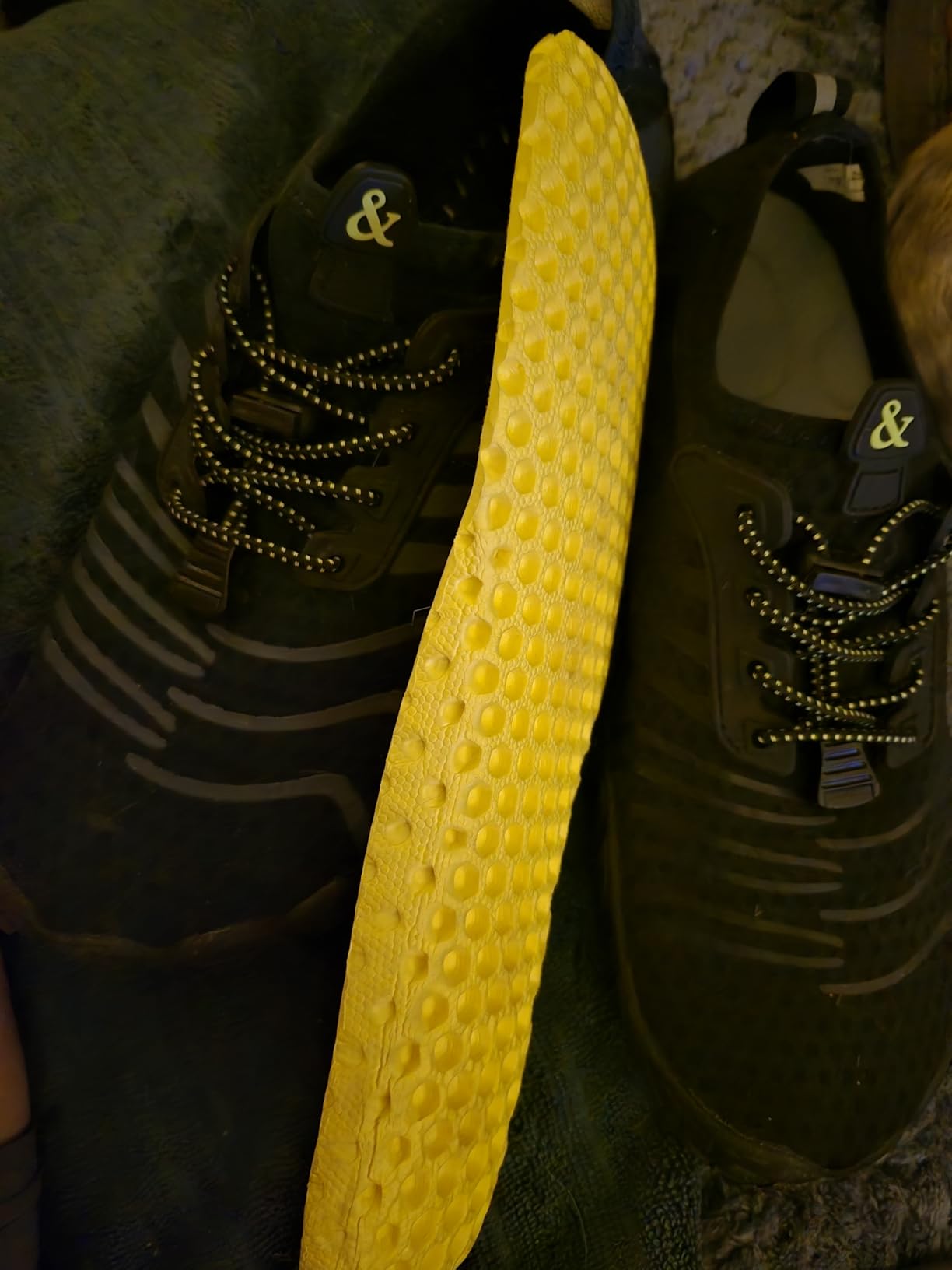 Bottom view of Ziitop water shoe sole showing drainage hole pattern arrangement and grip texture detail