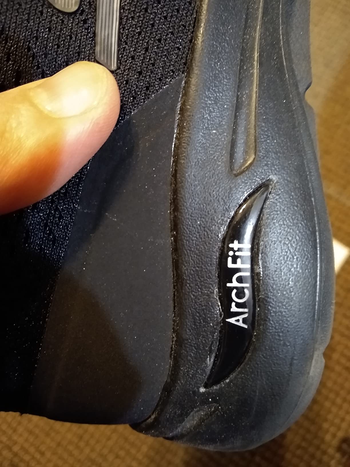 Skechers Go Walk Arch Fit outsole showing dual-density rubber traction pattern and grip design detail