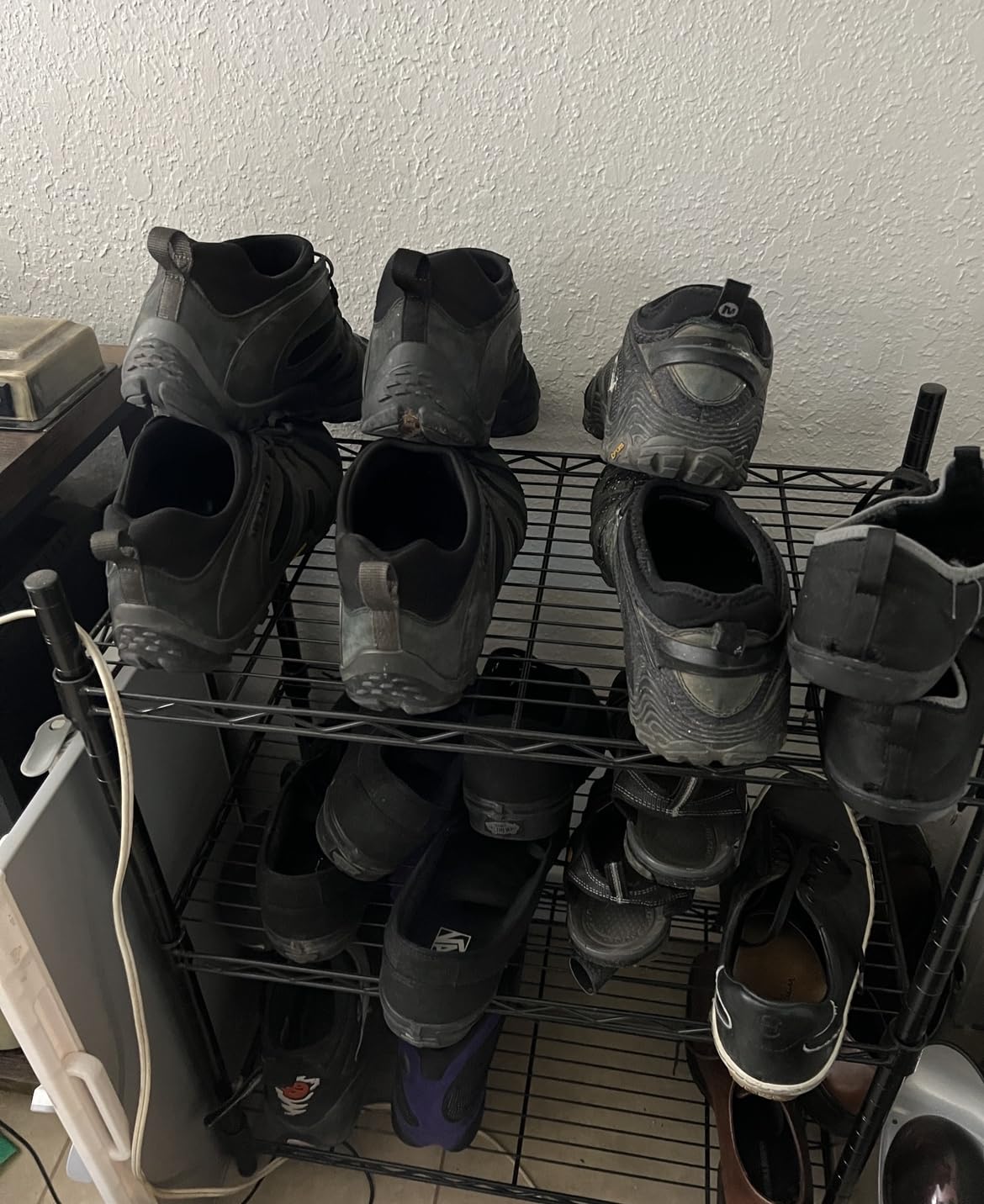 Multiple angle view of Merrell Chameleon 8 showing durability construction quality at 8-week testing mark