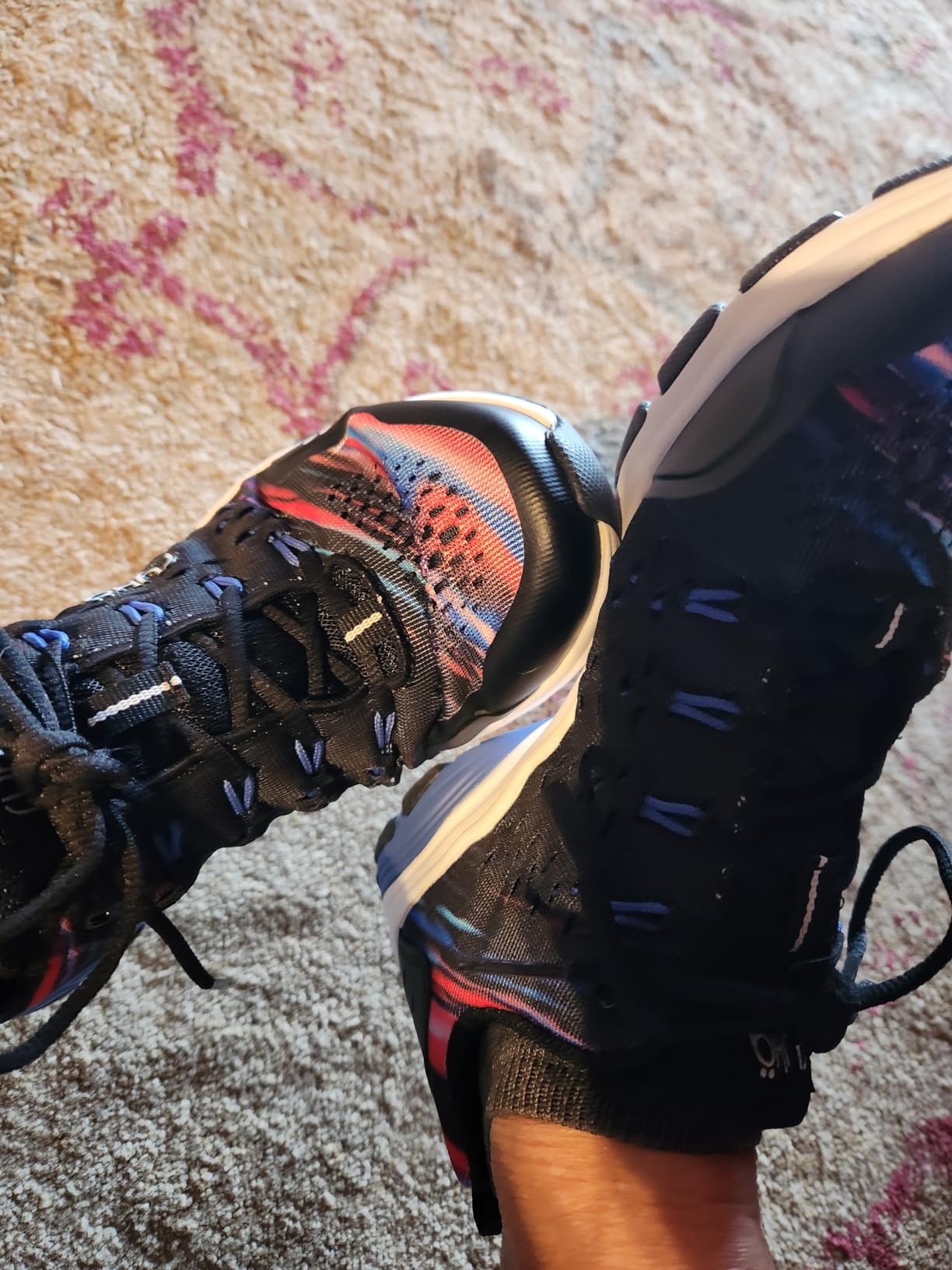 Close-up of Ryka Vivid RZX engineered mesh upper showing integrated fabric lace loops and breathable construction