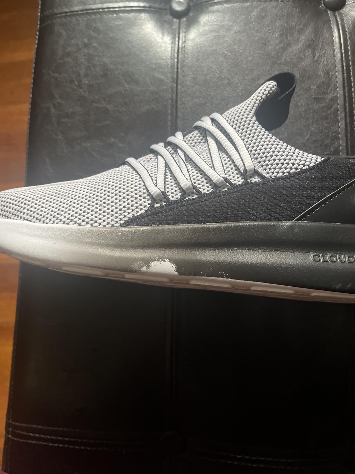 Adidas Men's Lite Racer Adapt 7.0 sneakers showing slip-on design and lightweight Cloudfoam construction