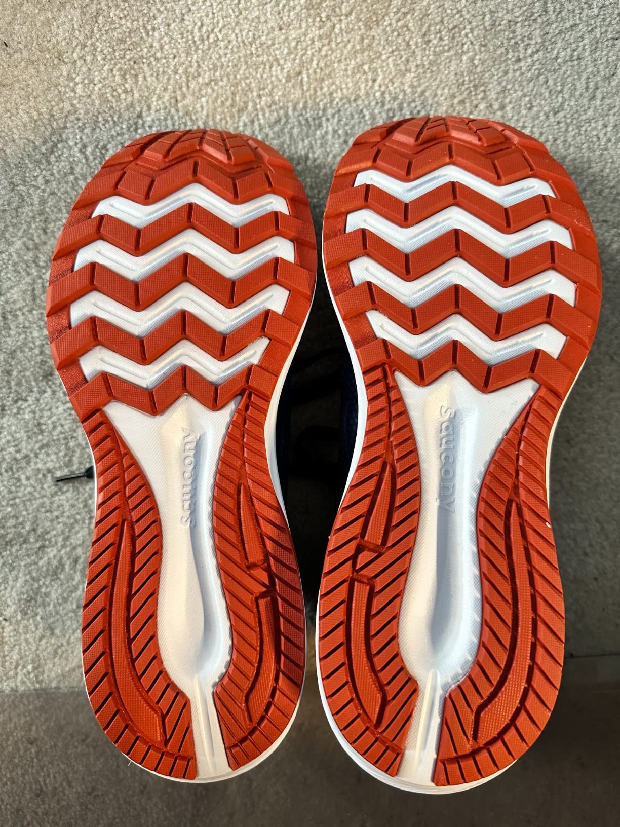Side profile of Saucony Cohesion 16 showing VERSARUN EVA midsole technology and 12mm heel-to-toe drop geometry