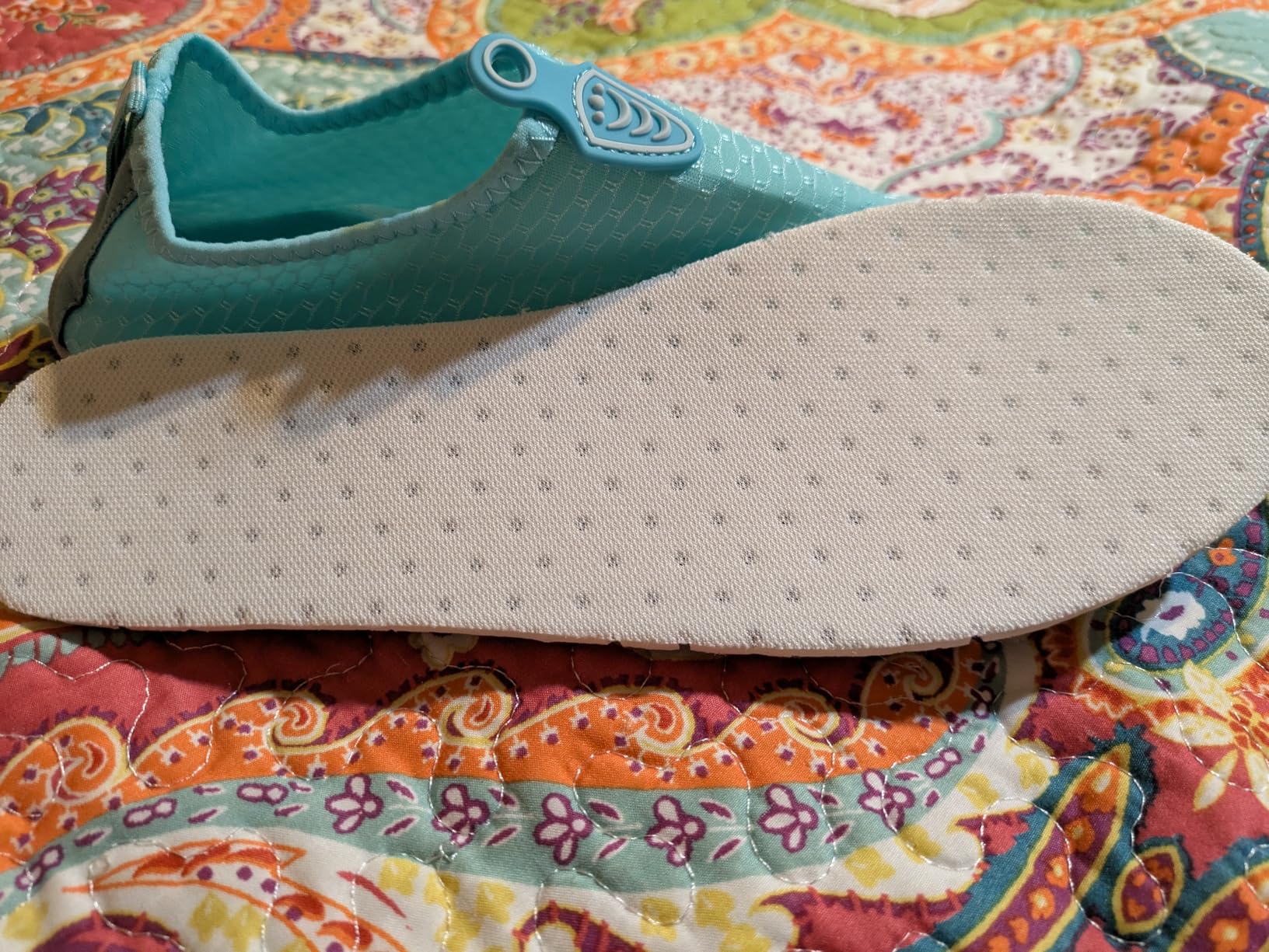 Close-up of Vsufim water shoes showing breathable mesh upper construction and EVA sole design