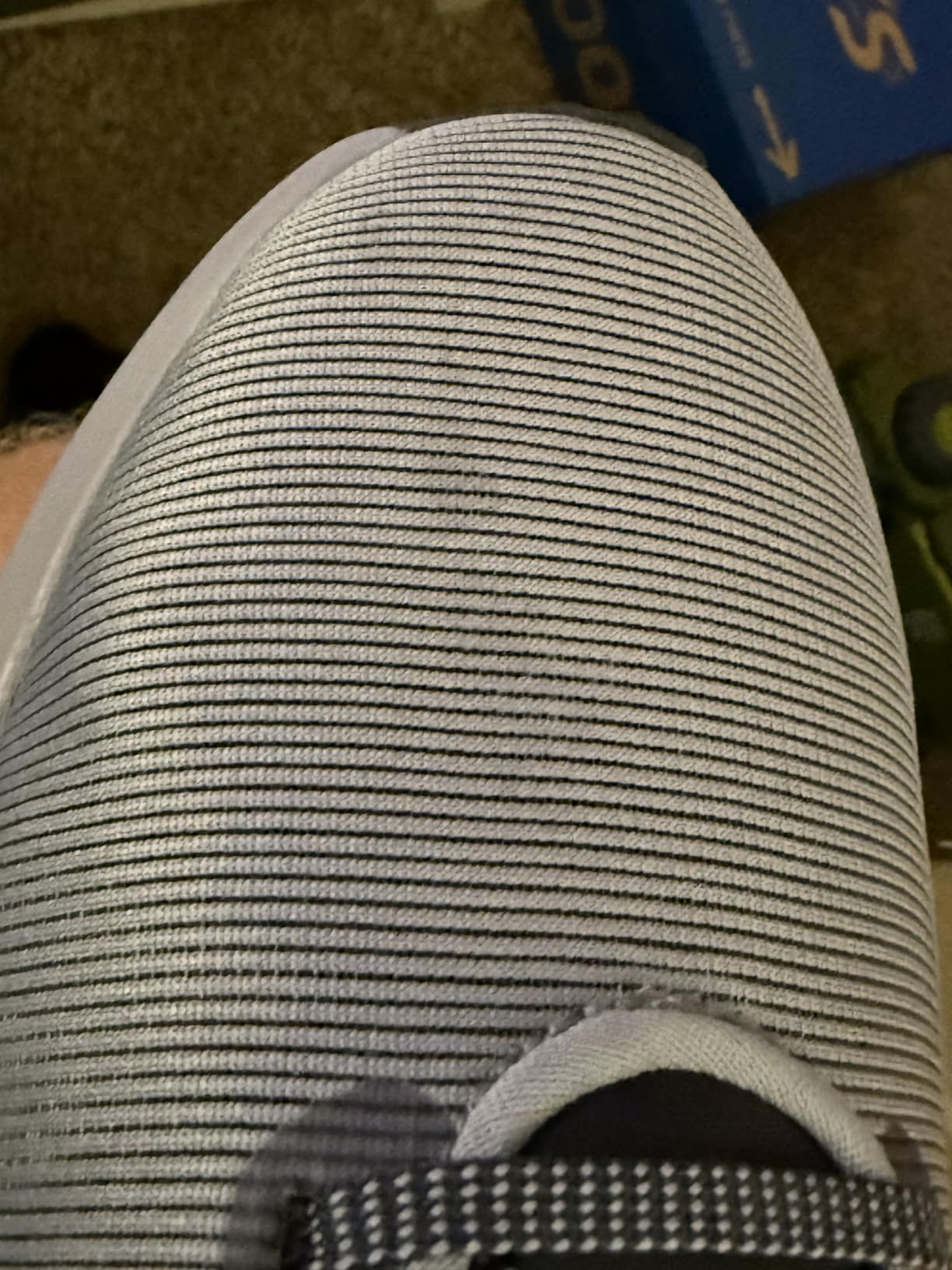 Nike Downshifter 12 midsole detail showing foam construction and heel cushioning depth