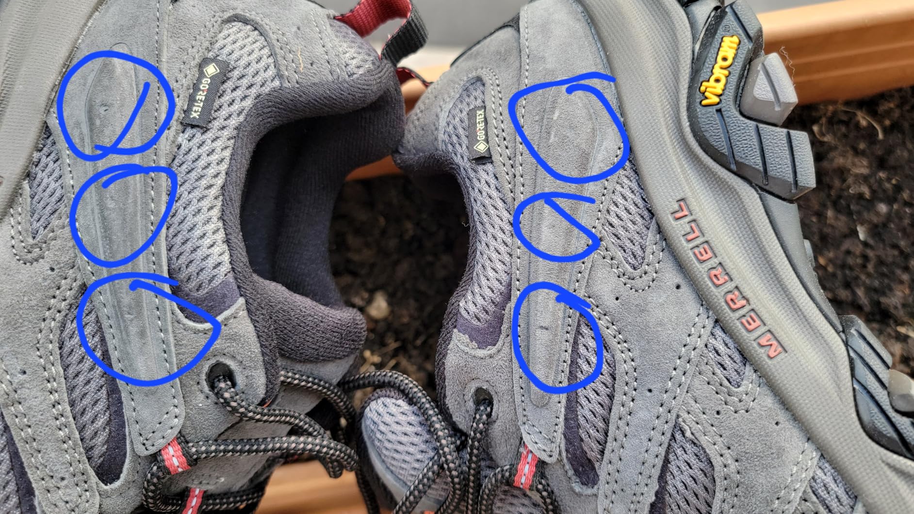 Merrell Moab 3 boots showing construction quality examination for durability assessment