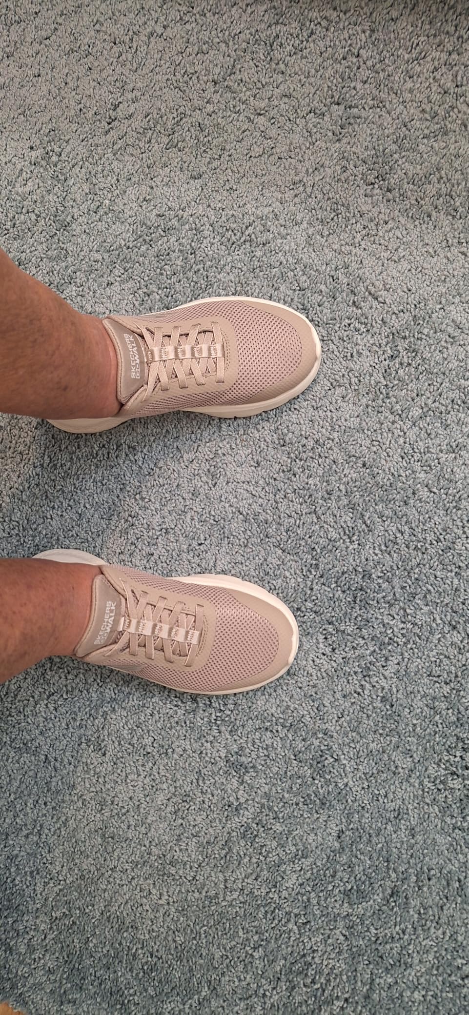 Skechers Women's Go Walk Flex Hands Free slip-on sneakers in beige showing the memory foam comfort design and hands-free slip-in heel system