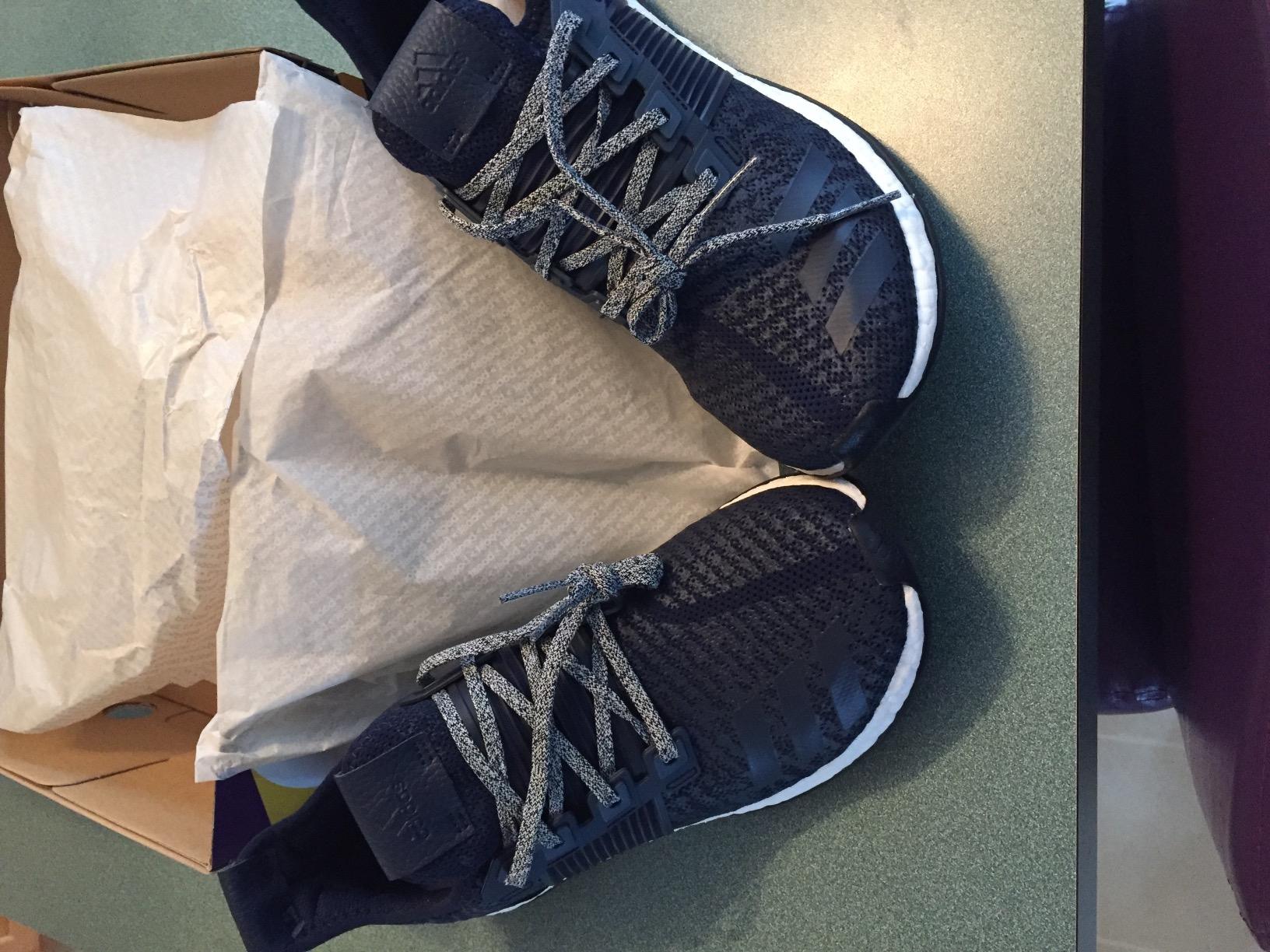Adidas Pureboost ZG heel and midfoot area showing the TPU stabilizer panels and collar construction