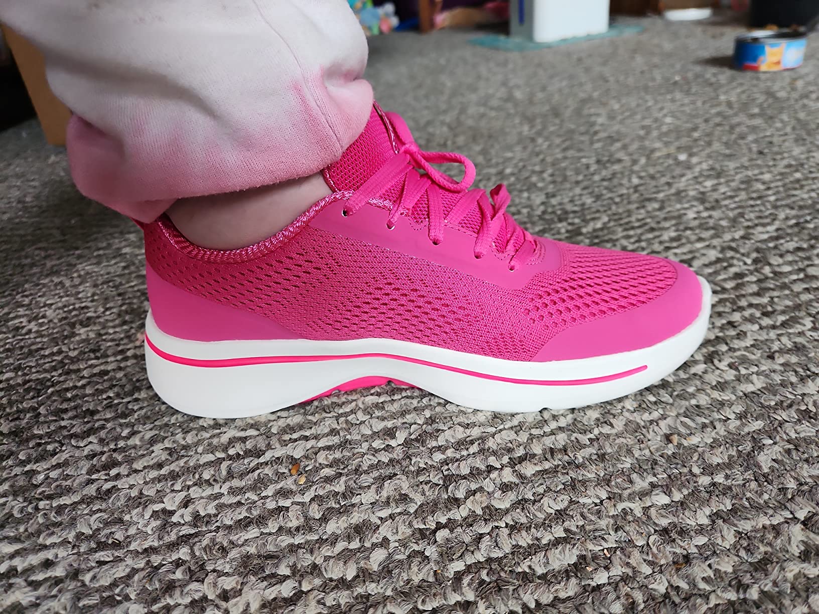 Skechers Women's Go Walk Arch Fit Motion Breeze walking shoe in white showing engineered mesh upper and arch support technology