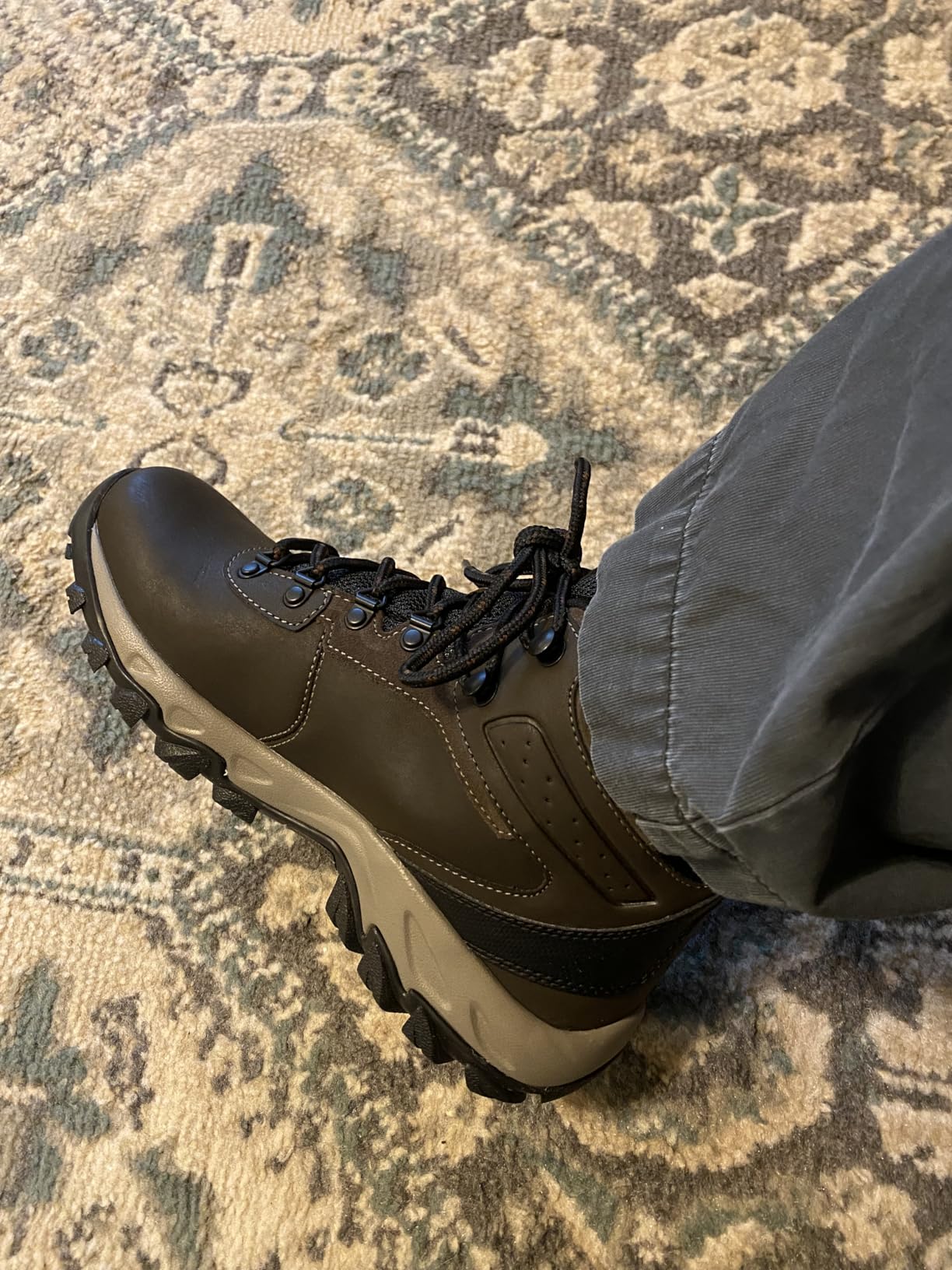 Columbia Newton Ridge Plus II boots on rocky trail terrain showing traction in real use