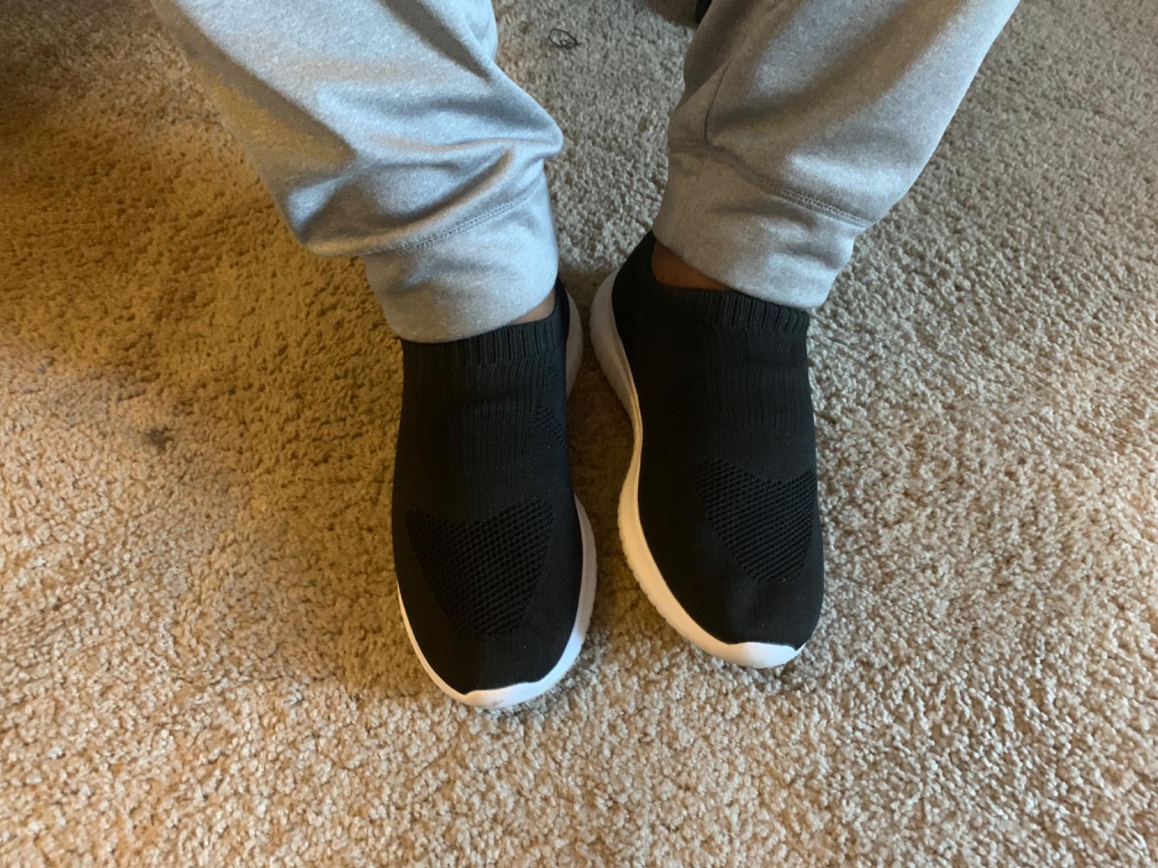 Konhill men's athletic walking shoes shown on feet demonstrating real-world fit during casual daily activities