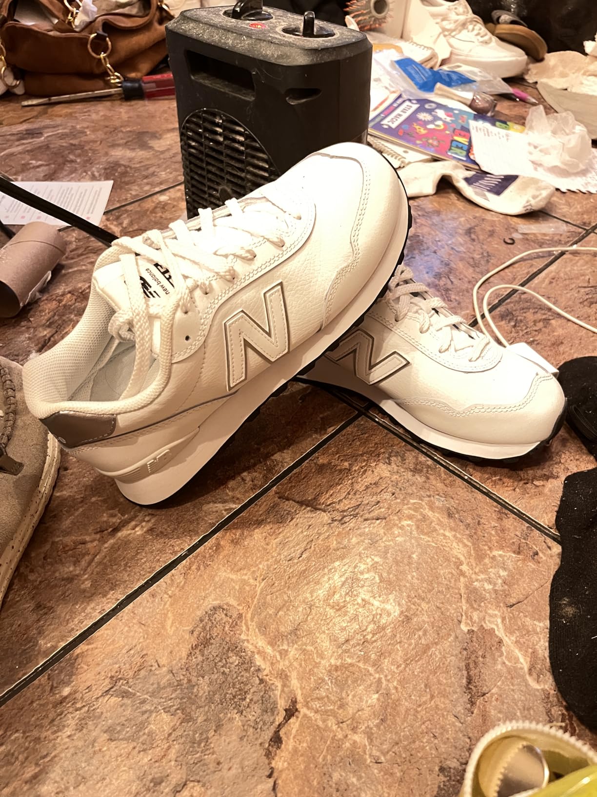 New Balance 515 V3 side profile showing leather upper construction and iconic N logo branding detail
