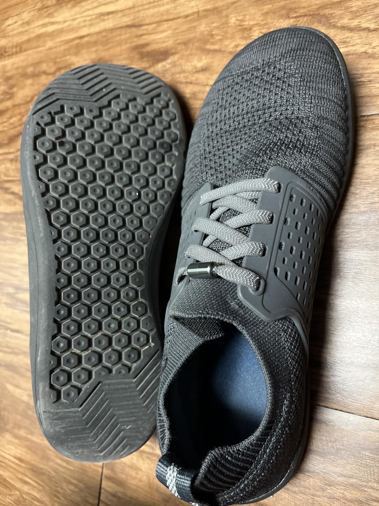 Close-up of WHITIN barefoot sneakers showing wide toe box design with room for natural toe splay