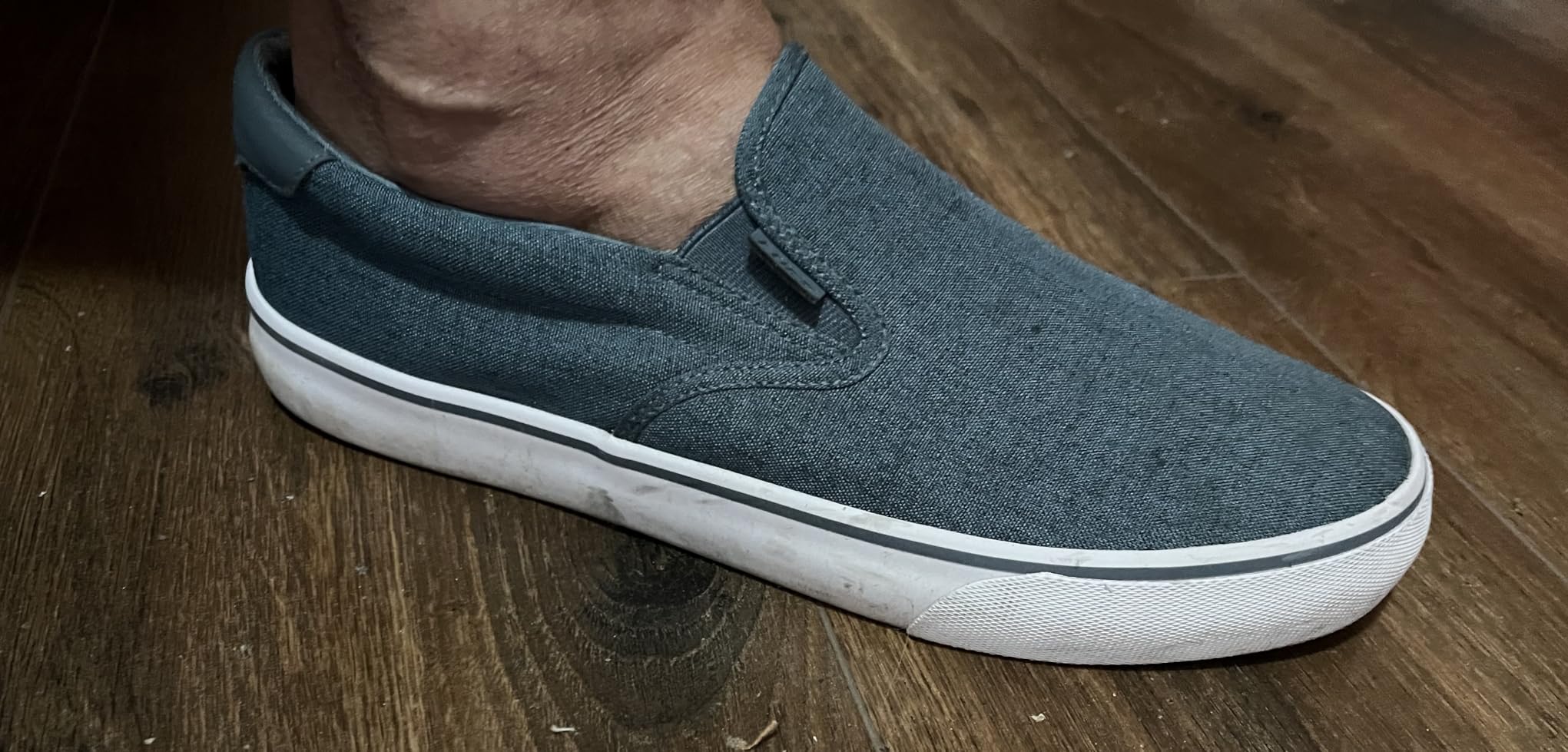 Close-up of Lugz Clipper canvas texture and toe cap area showing construction details and material quality