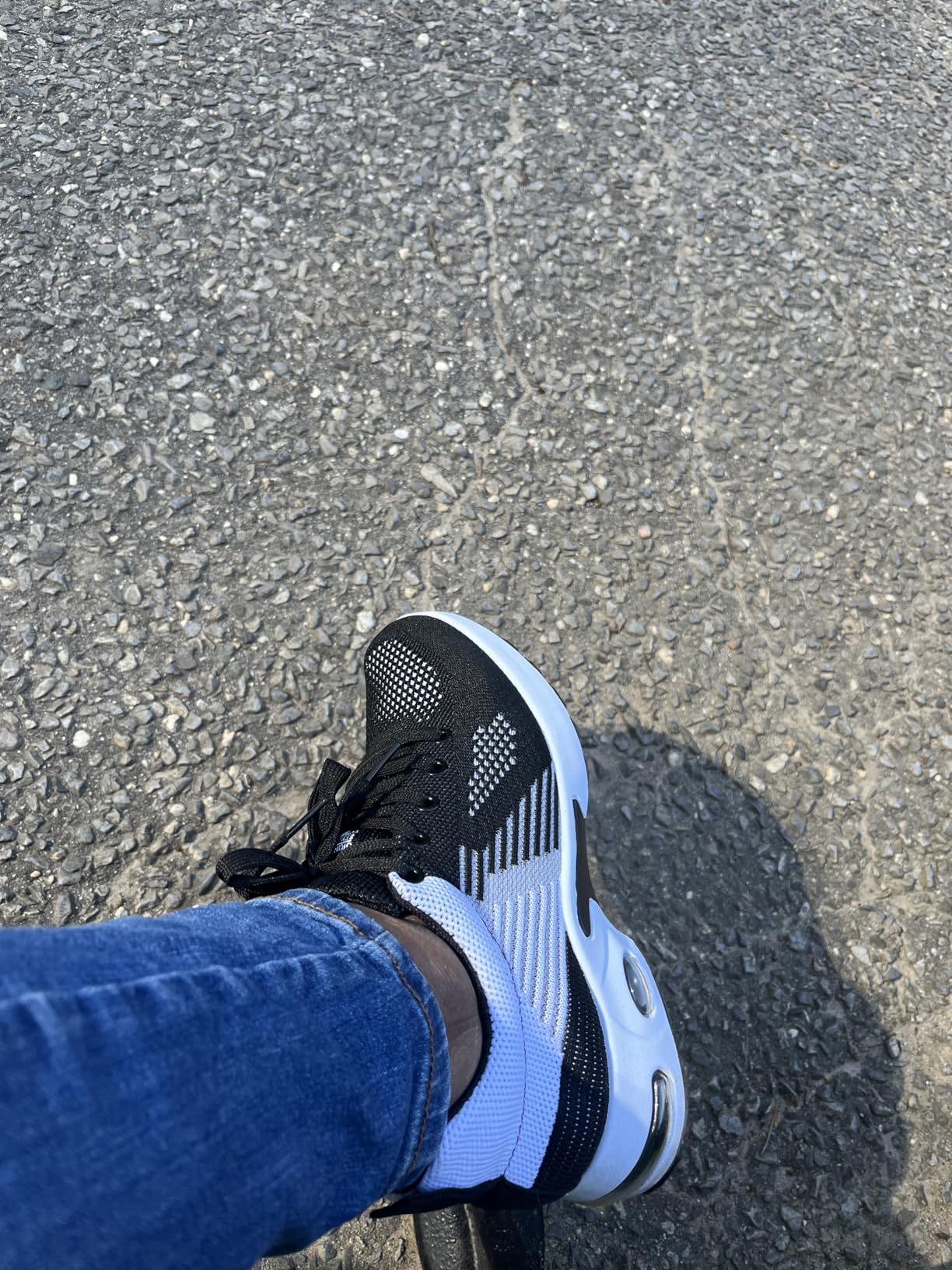 Side profile view of Padgene women's sneakers showing EVA air cushion midsole design and construction