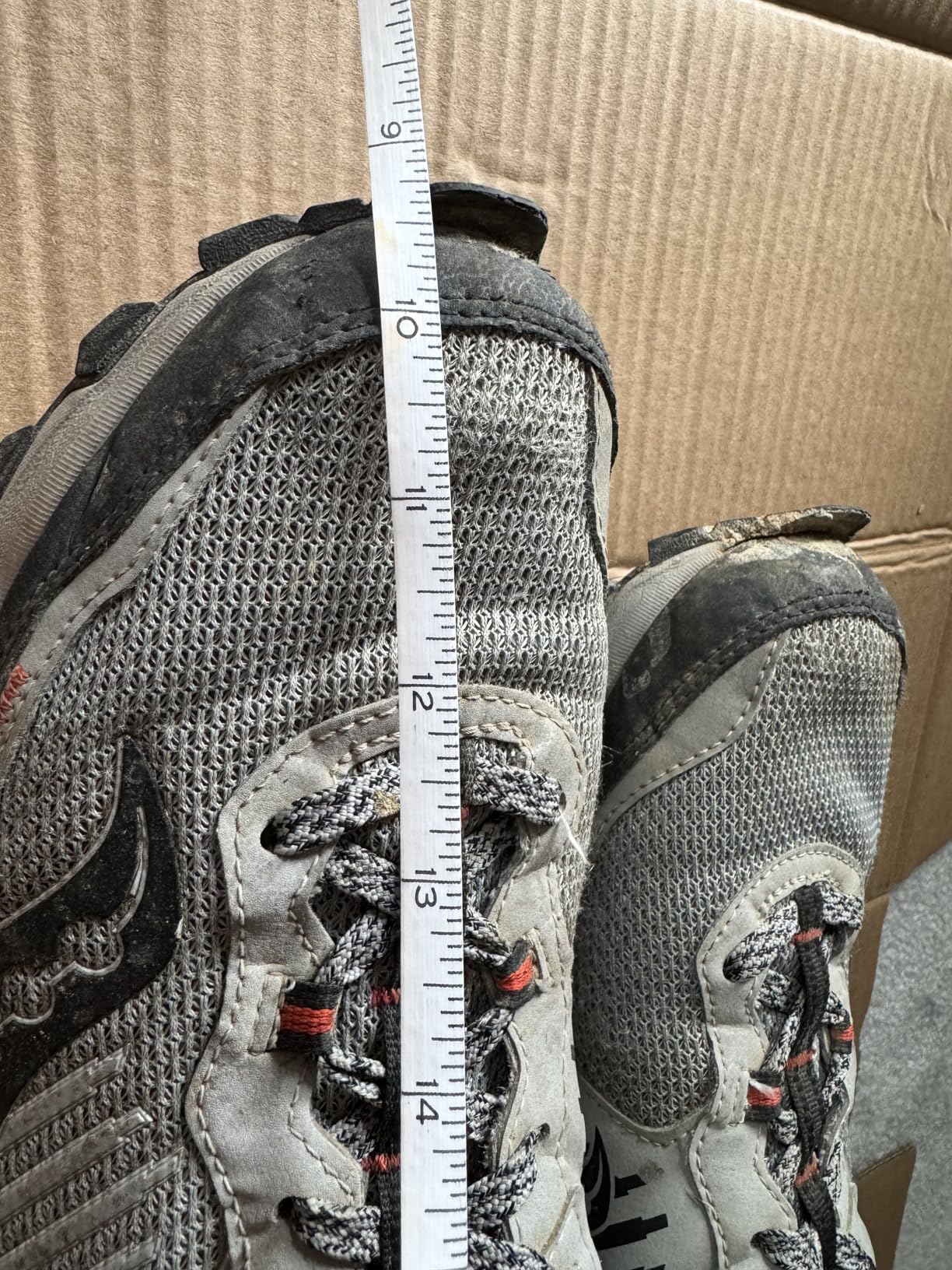 Comparison showing sole separation issues on Saucony TR15 after several months of regular trail use
