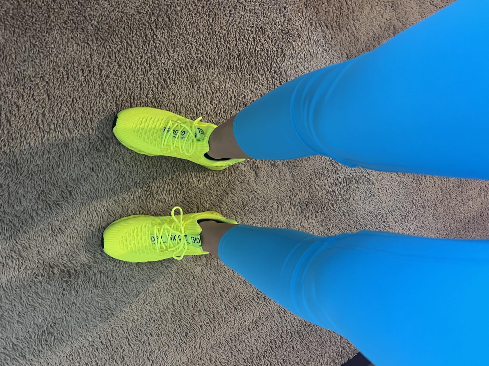 Close-up of SKDOIUL mesh fabric weave and elastic lacing system showing construction quality and breathable structure