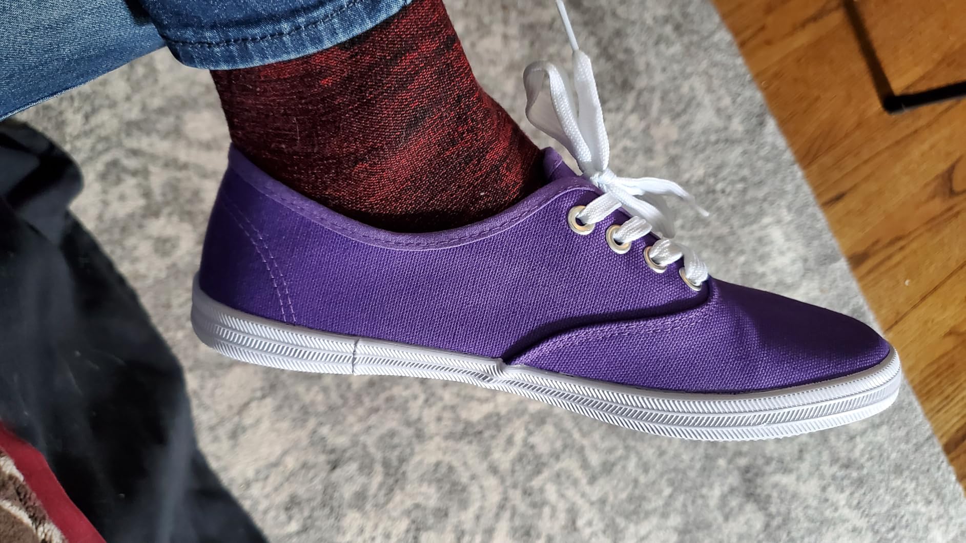 TUOPIN women's sneakers worn outdoors with jeans showing real-world styling and fit