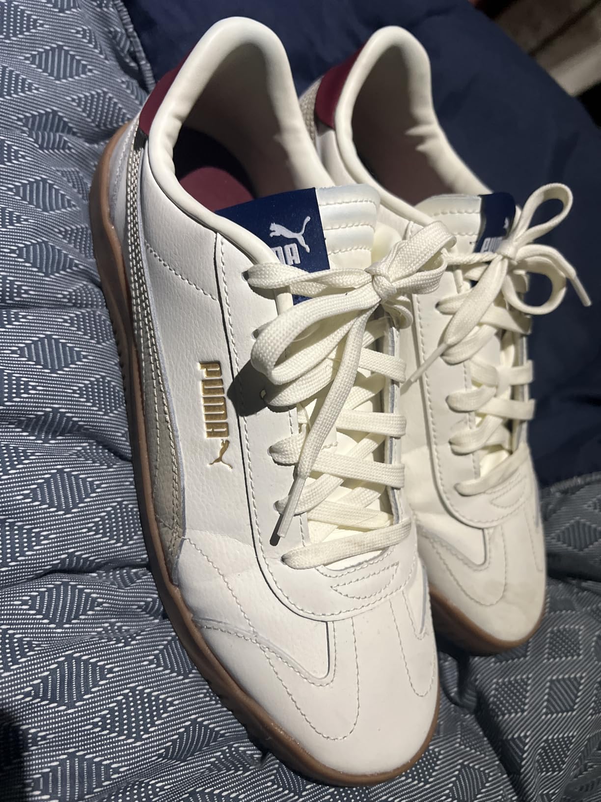 PUMA Club 5v5 detail showing terrace culture design elements and foil print branding on lateral side
