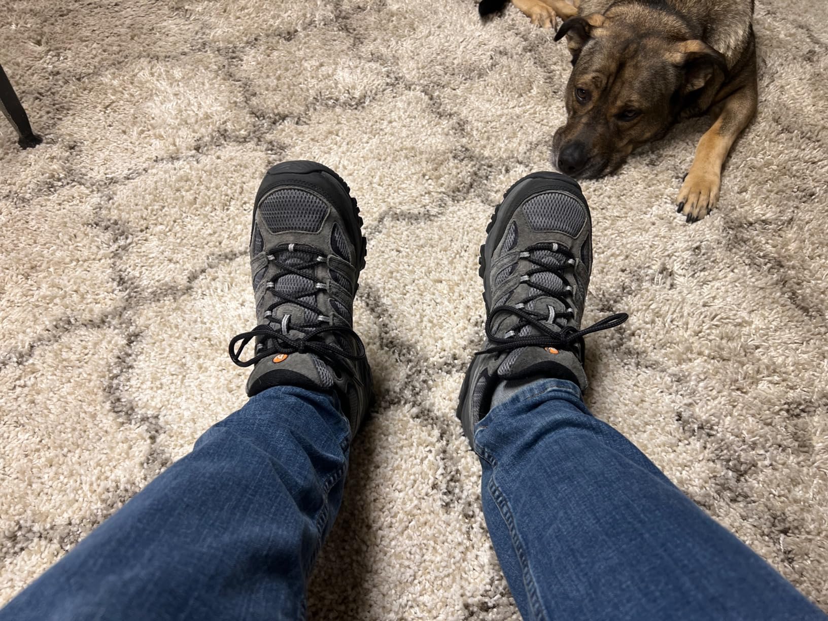 Merrell Moab 3 being tested in muddy and wet trail conditions showing traction performance on soft terrain