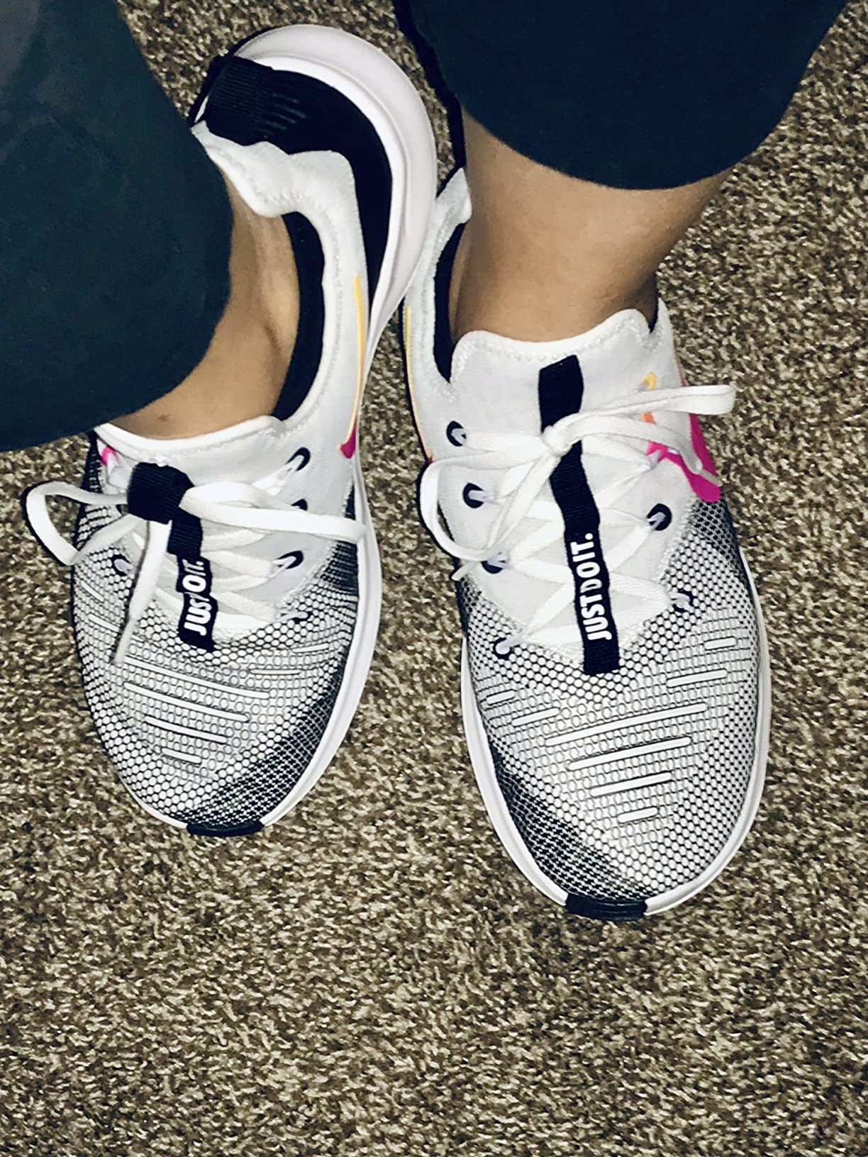 Final product view of Nike Women's Multisport Indoor Fitness Shoes showing the complete design from multiple angles