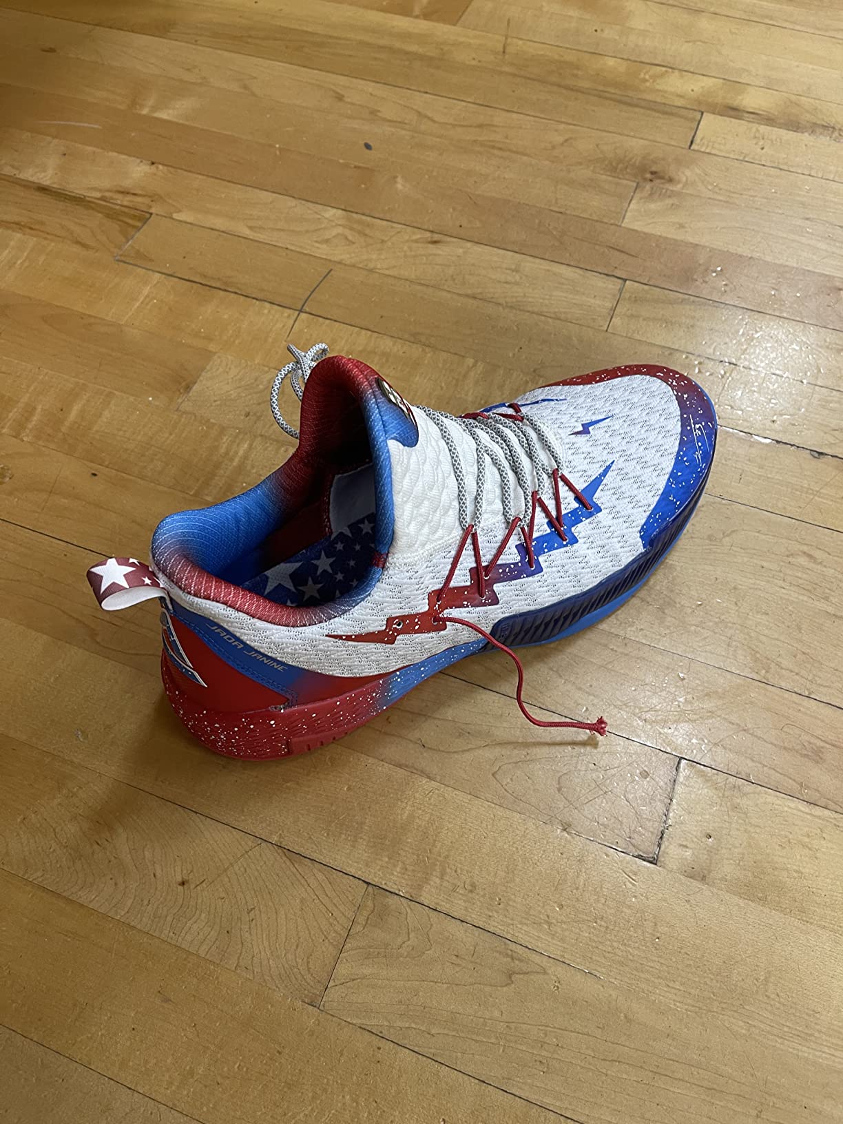 PEAK basketball shoe component failure showing broken lace loop anchor and structural compromise