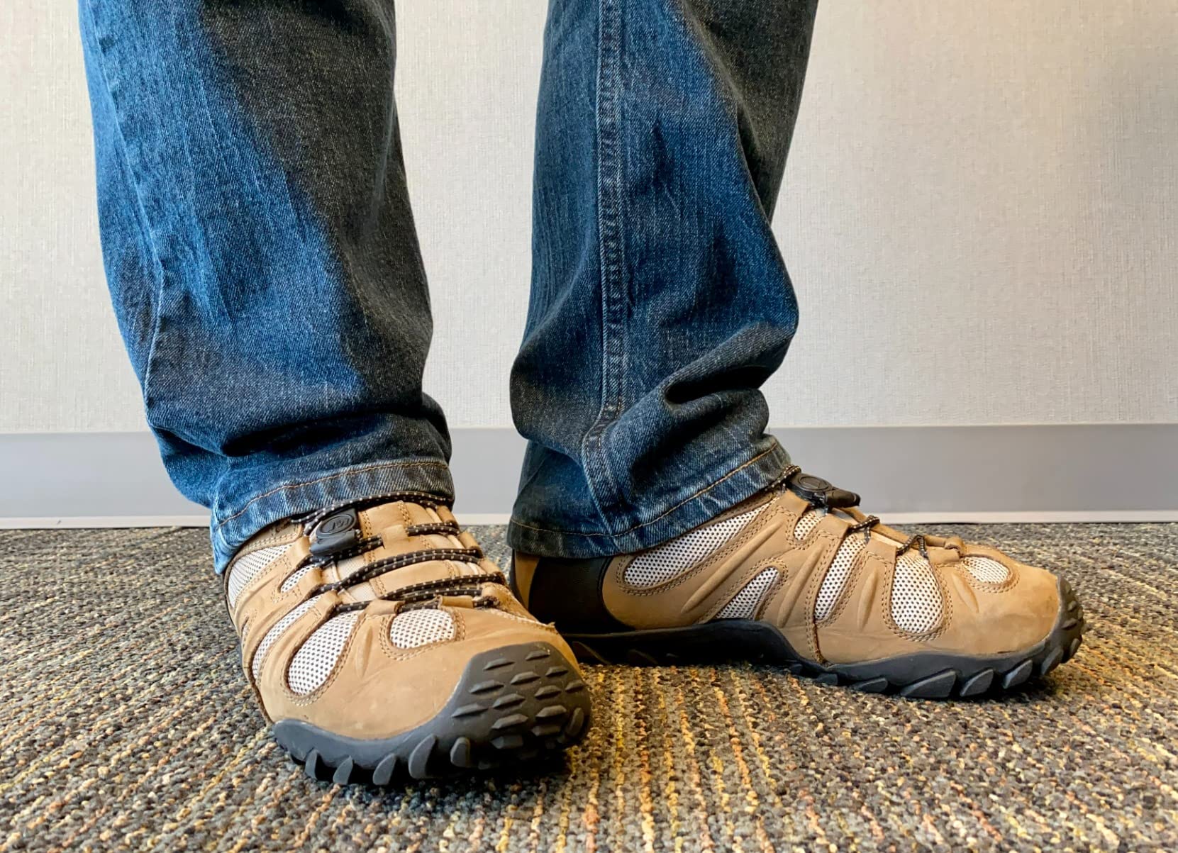 Merrell Chameleon 8 construction inspection showing upper stitching quality and midsole interface after extended testing