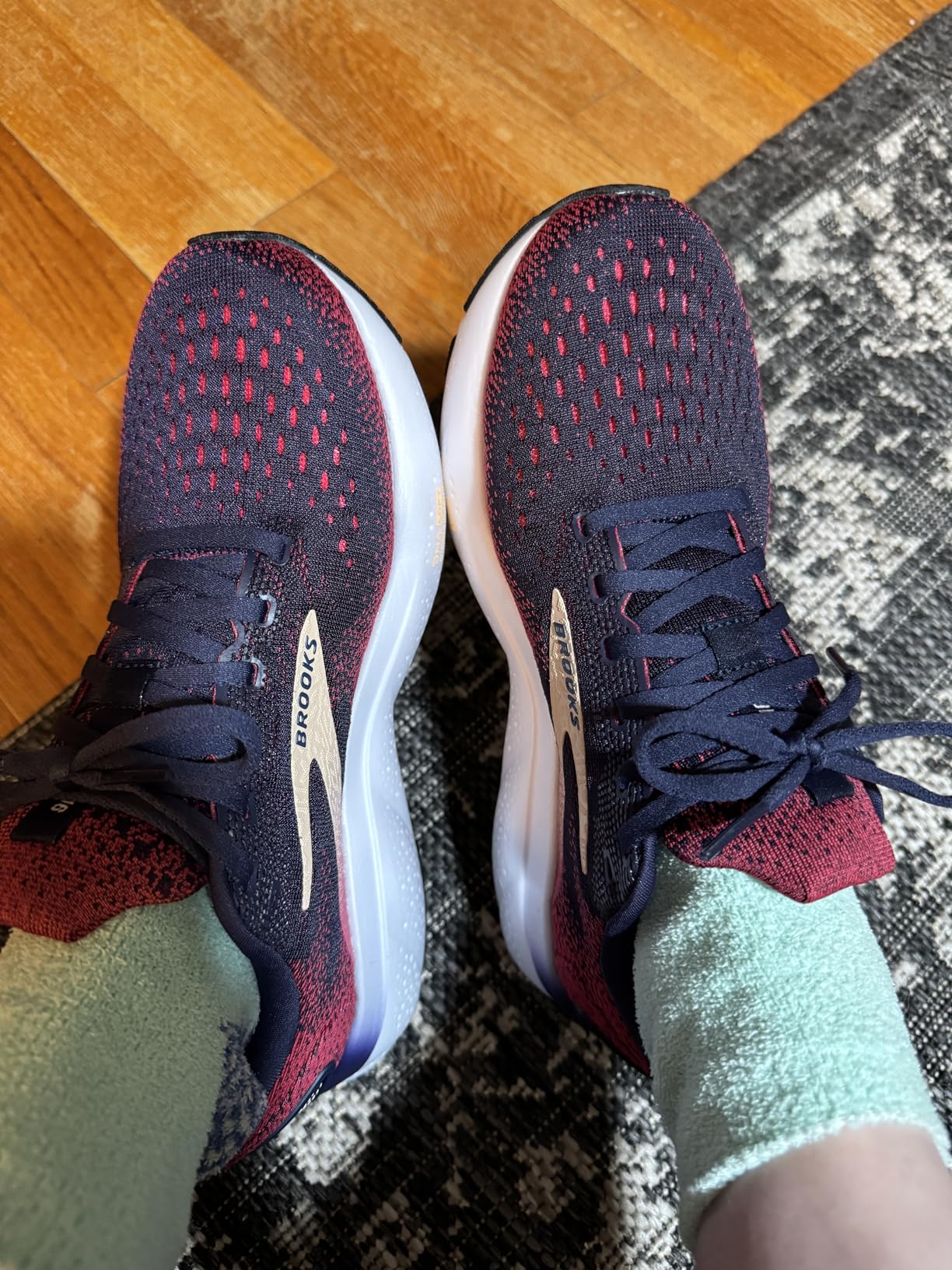 Brooks Ghost 16 women's side profile in lifestyle setting showing versatile design suitable for multiple daily activities