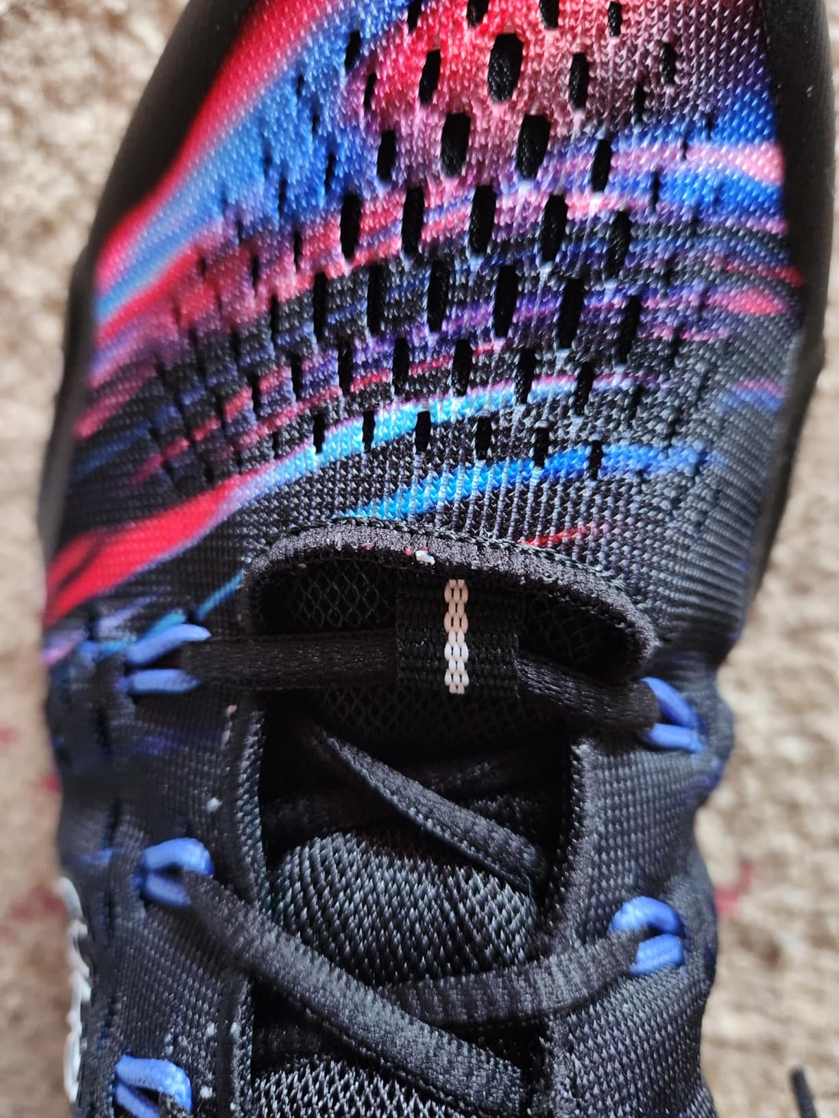 Side profile of Ryka Vivid RZX showing heel counter support architecture and overall silhouette