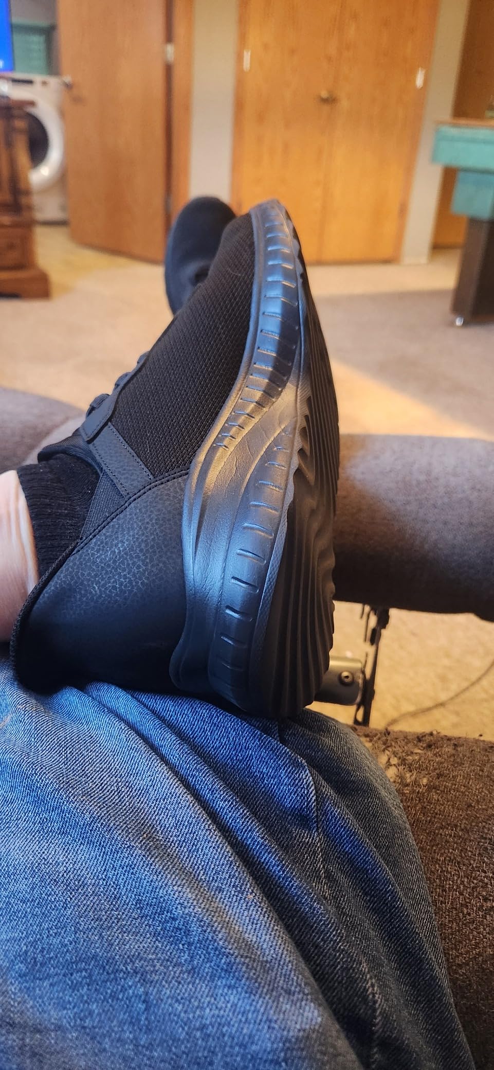 Skechers slip-ins worn during outdoor casual walking showing breathable mesh upper performance